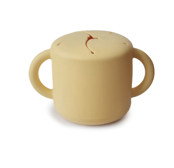 A Mushie baby silicone snack bowl, a stylish and eco-friendly option for your little one's mealtime