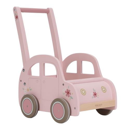 Little Dutch wooden push cart in vintage pink, used by a toddler to help with first steps and store toys.